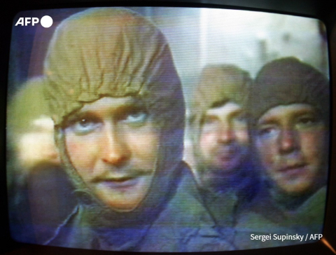 Image TV de liquidateurs, musée Tchernobyl à Kiev - Sergei Supinsky - AFP