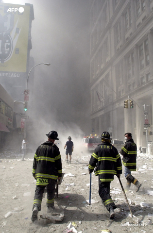 Des pompiers à Ground Zero le 11/09/2001 - Stan Honda - AFP