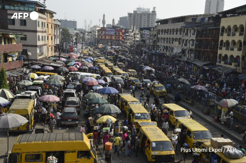 Lagos, 16 décembre 2019, vendeurs de rue - Pius Utomi Ekpei - AFP