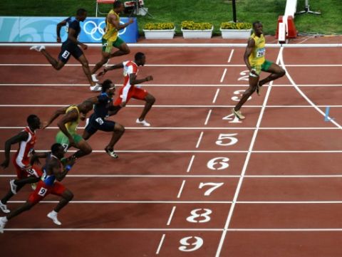 Le Jamaïcain Usain Bolt remporte le 100m à Pékin le 16 août 2008 en 09s69 - Nicolas Asfouri - AFP