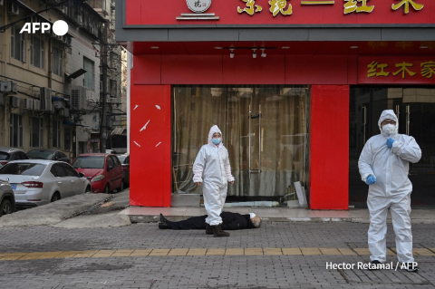 Wuhan, Chine, janvier 2020, des membres du personnel médical portant des vêtements de protection. - Hector Retamal - AFP