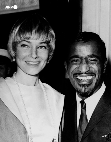 Sammy Davis Jr and his wife May Britt in the 1960s - AFP