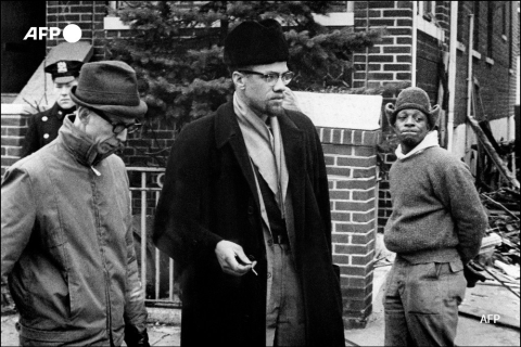 Malcolm X (C) as leader of the Organization of Afro-American Unity - Stringer - AFP