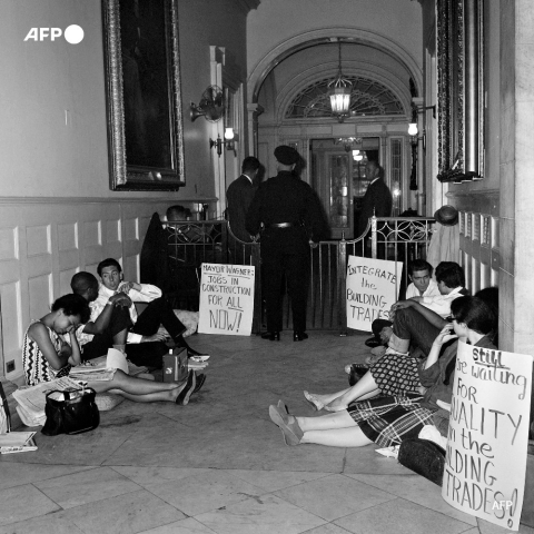 A sit-in at New York's town hall in 1963 to protest job discrimination - AFP