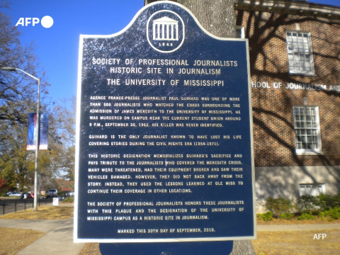 A sign at the University of Mississippi in memory of slain AFP journalist Paul Guihard - AFP