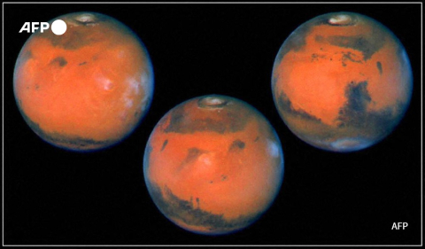 Photographies de la planète Mars vue par le télescope spatial Hubble, en mars 1997 - AFP