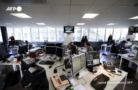 Le service économique de l'AFP à Paris en février 2012 - Lionel Bonaventure - AFP