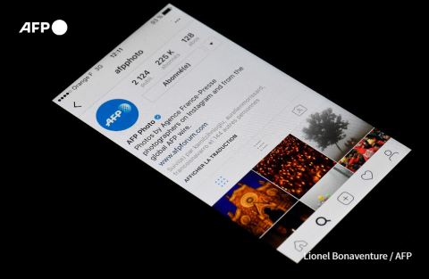 Le compte Instagram de l'AFP sur un smartphone en 2016 - Lionel Bonaventure - AFP