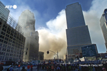 In this photo took on 12th September 2001, smoke is coming out of the World Trade Center in New York after the September 11 attacks.